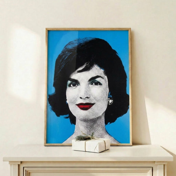 Colorful pop art wall print featuring simplified facial features rendered in striking complementary hues with bold graphic edges.