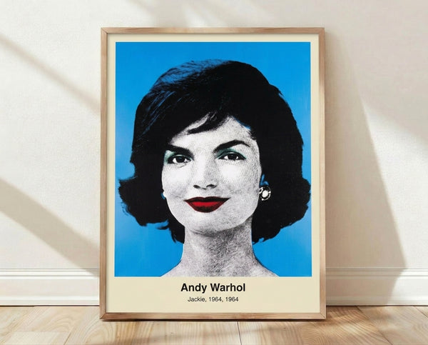 Pop art portrait in black, silver, and flesh tones depicting a woman's face with bold graphic qualities and repeated color blocks characteristic of 1960s modern art.