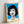 Abstract pop art portrait with striking silver and black color separation showing a woman's face in bold, simplified forms reminiscent of iconic 1960s screen print aesthetics.