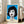 Poignant pop art face portrait in black, white, and metallic tones featuring simplified facial features and historically significant graphic treatment.