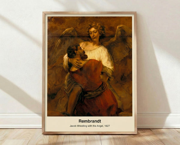 Framed poster of Rembrandt's dramatic Baroque painting depicting Jacob wrestling with an angel, rendered in warm browns and golds with intense spiritual struggle.
