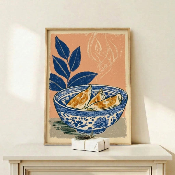 Framed poster of a serene bowl of dumplings in deep blue porcelain with botanical elements, featuring warm tan and cream tones in contemplative Japandi aesthetic.