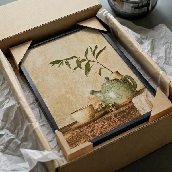 Tranquil framed poster depicting a zen tea ceremony arrangement with teapot, cup, vase, and branch in soft sage green and warm neutral tones on cream.