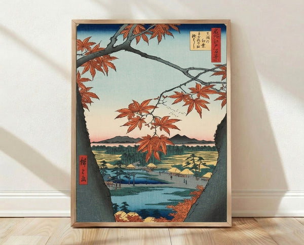 Serene Japanese woodblock print featuring autumn maple leaves and branches overlooking a misty mountain landscape with temple nestled among forest green trees and deep blue water.