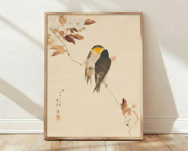 Framed Japanese watercolor art print featuring songbirds perched on autumn branches with golden-yellow leaves, rendered in warm ochre and charcoal tones on a cream background.