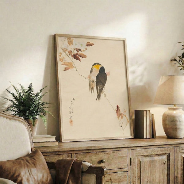 Japanese wabi-sabi inspired poster art featuring birds among charcoal and ochre autumn foliage, rendered in soft watercolor on cream ground.