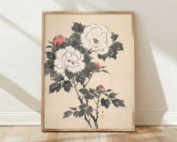Serene Japanese woodblock art print featuring delicate peonies with rose-red blooms, pale green leaves, and buds rendered in charcoal gray on cream background, framed on wall.