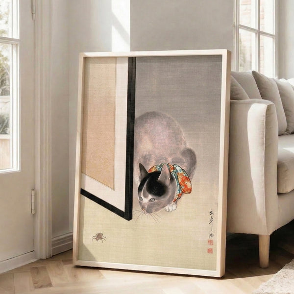 Japanese-inspired poster art depicting a graceful cat with ribbon, rendered in delicate woodblock print style using a palette of cream, grey, black, and touches of red-orange and turquoise.
