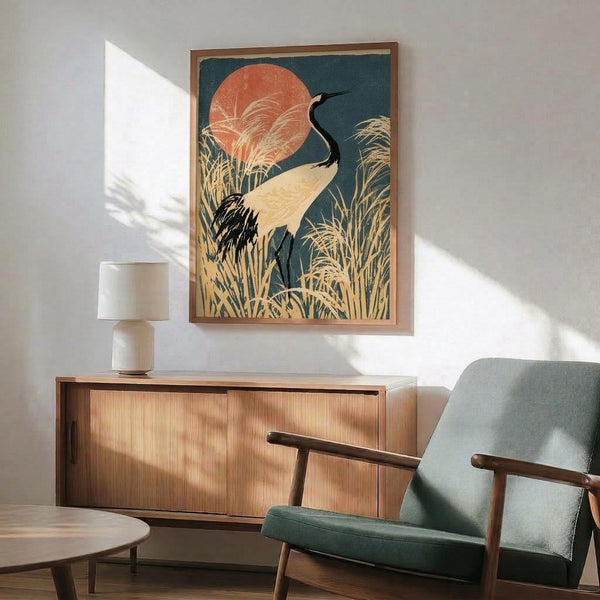 Vintage-inspired art print of a contemplative crane in tall reeds beneath a glowing sunset, executed in traditional Japanese style with muted teal and warm coral hues on cream background.