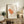 Minimalist framed kimono illustration in japandi style with refined line work, showcasing traditional fabric draping in soft beige and warm orange tones.