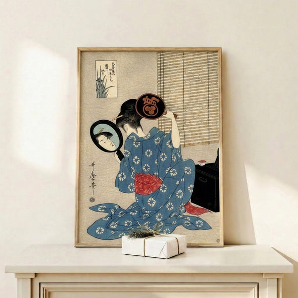 Wall art print in traditional Japanese woodblock technique featuring a geisha in patterned kimono attending to her reflection, suffused with contemplative mood and classic blue and cream coloring.