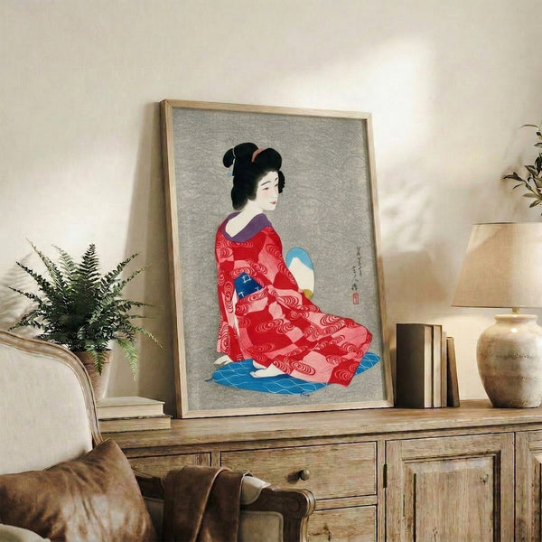 Traditional Japanese woodblock-inspired framed print showing a serene geisha in luxurious red kimono, combining warm and cool tones in a sophisticated composition.
