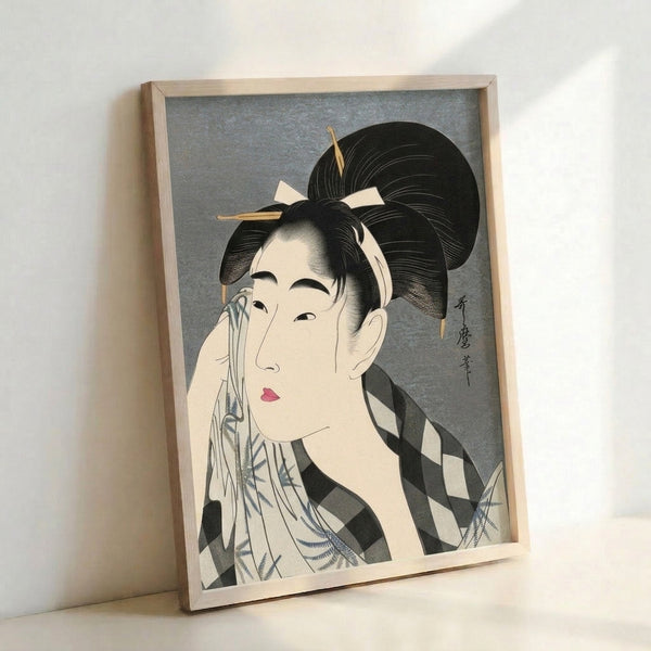Traditional Japanese woodblock art print showing a sophisticated geisha in ornate kimono pausing in a contemplative moment, executed in soft grays and pink accents.