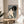Framed ukiyo-e inspired print portraying an elegant geisha in traditional dress with serene, introspective expression in cream, gray and pink tones.