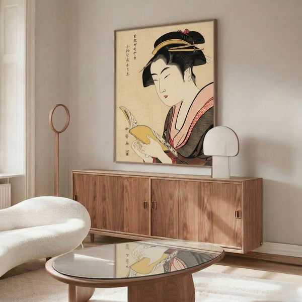 Creamy-toned ukiyo-e poster art of a serene geisha reading, featuring deep black linework, warm gold highlights, and subtle red tones in the authentic Japanese woodblock printing aesthetic.