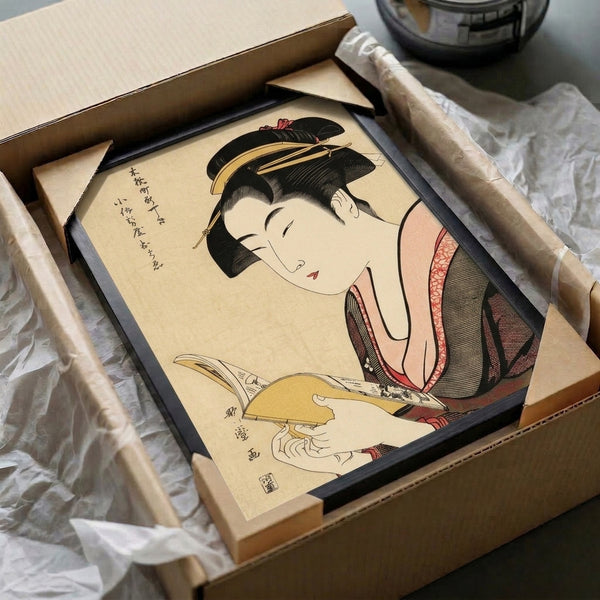 Elegant Japandi-style framed art print showcasing a contemplative geisha in ceremonial dress with decorative fan and hair ornament, combining traditional woodblock techniques with a refined palette of cream and black.