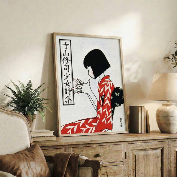 Contemplative Showa-period Japanese art print featuring a woman in pale pink and red kimono amid delicate flora, displayed as a cultural wall hanging with refined woodblock-style composition.