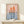 Serene Japanese nautical poster featuring a junk sailboat in minimalist composition with warm burnt orange and cool deep blue watercolor-like tones.