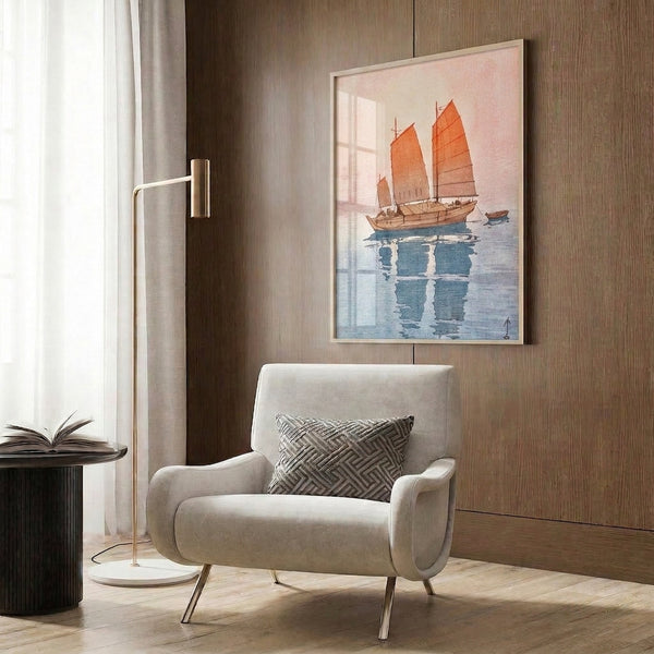 Framed minimalist poster of a Japanese junk with billowing sails, rendered in nostalgic burnt orange, deep blue, and cream palette on gallery wall.