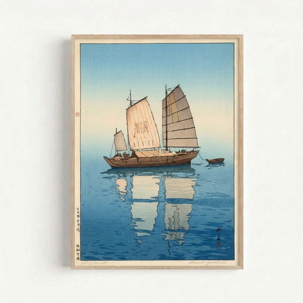 Framed ukiyoe-style maritime artwork depicting a traditional sailing vessel on tranquil waters with soft cream and blue tones, evoking contemplative coastal elegance.
