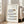 Line art kitchen knife collection poster in neutral tones of gray, tan, and black, featuring instructional-style blade and handle designs on cream.