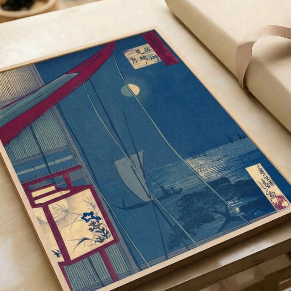 Elegant framed Japanese woodblock print featuring nighttime moon-viewing with sailboat on indigo waters, traditional building elements, and glowing lantern in Showa-period style.