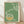 Minimalist Japanese woodblock print featuring a crane and enso circle in moss green, cream, and golden ochre tones, creating a serene, meditative aesthetic on a framed poster.