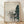Serene Japanese woodblock-style poster featuring a crane in a misty forest with a traditional torii gate and pine trees in cream, gray, and dark green tones.