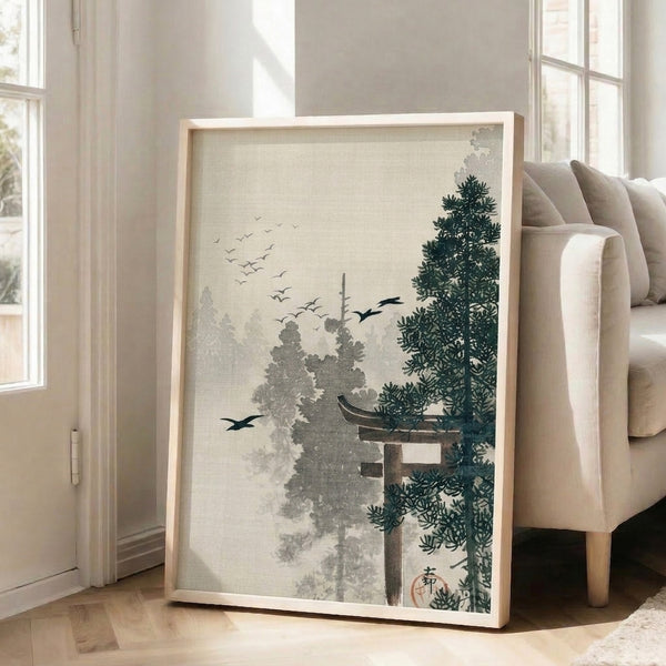 Framed poster art showing a tranquil crane in foggy forest landscape with traditional torii gate and dark green vegetation in cream and gray palette.