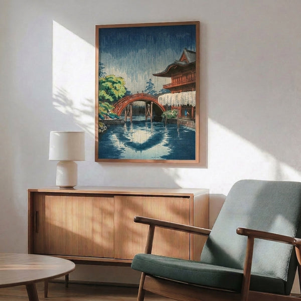 Peaceful framed artwork in traditional Japanese printmaking style, showing a rain-covered temple landscape with architectural and natural elements in muted, harmonious colors.