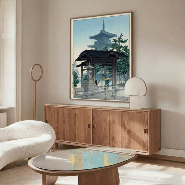 Woodblock-style poster of a contemplative rainy evening at a Japanese pagoda gate, featuring delicate brushwork in navy, green, and soft gold tones.