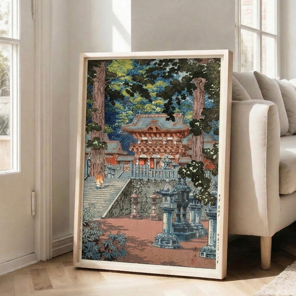 Cultural Asian art print in traditional woodblock style showing Nikko Toshogu Temple's gate, courtyard steps, and surrounding forest in muted greens and warm cream tones.
