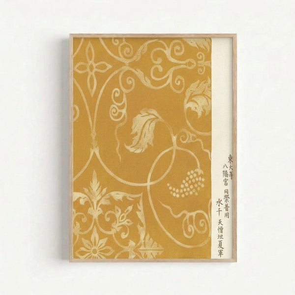 Elegant gold and ochre floral scrollwork pattern drawing from traditional Japanese woodblock aesthetics, displayed as a framed art print on a wall.