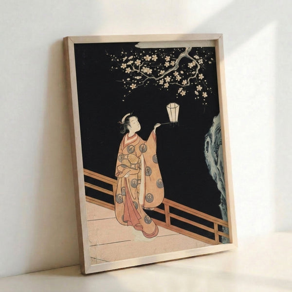 Japanese-inspired wall art featuring a woman at a railing with illuminated lantern under delicate cherry blossoms, combining woodblock techniques with serene, introspective atmosphere.