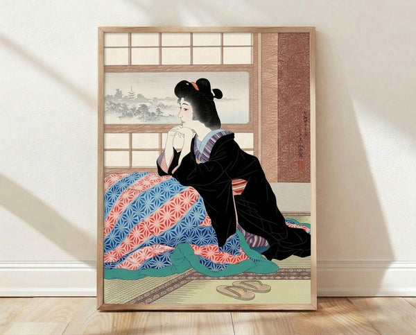 Framed Japanese woodblock print depicting a contemplative geisha in coral red kimono seated by a winter window, with serene domestic interior rendered in cream, black, and teal tones.