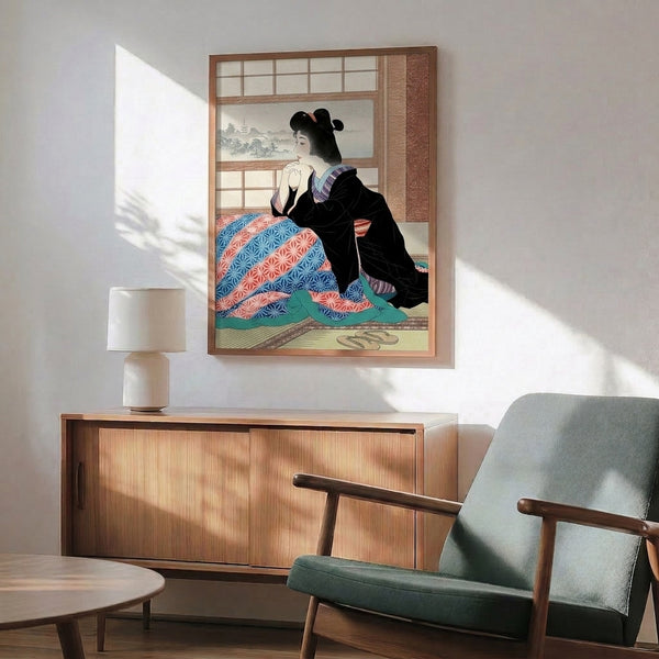 Framed ukiyo-e style artwork portraying a serene domestic moment: a woman in traditional attire near slippers and bedding by a frost-touched window with distant scenery.