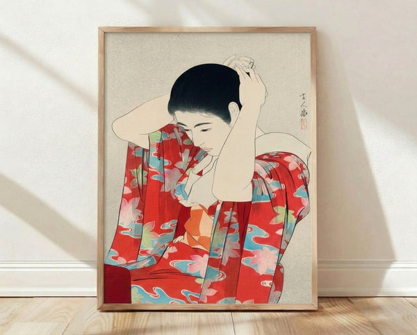 Serene geisha in ornate red and cream kimono with turquoise accents, rendered in Japanese woodblock style, framed on wall.