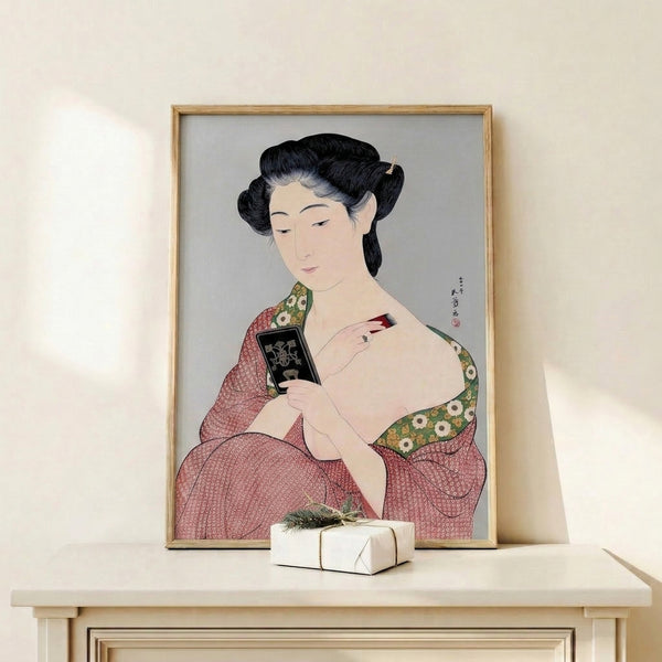 Serene portrait of a woman in elaborate kimono holding a mirror, executed in the Japanese woodblock tradition with cream, black, and metallic gold highlights creating an elegant, refined composition.