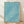Serene Japanese woodblock print featuring birds flying over stylized turquoise waves, rendered in minimalist style with cream and white accents; framed poster hung on wall.