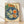 Framed vintage Japanese woodblock-style poster featuring steamed dumplings arranged on a blue willow plate with chopsticks and orange dipping sauce, rendered in cream, navy, and sage tones.