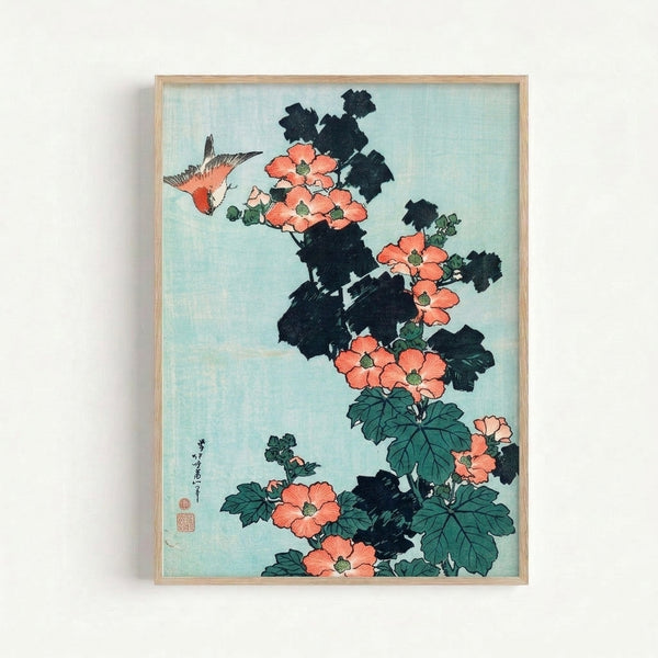 Wall-mounted botanical art print featuring a delicate bird amid blooming hibiscus in muted coral and blue-green hues, executed in traditional Japanese woodblock style with elegant linework.