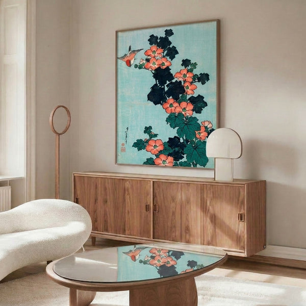 Japanese woodblock-style poster art showing a contemplative bird among hibiscus flowers and leafy branches in soft cream, coral-red, and sage green palette with striking black ink details.