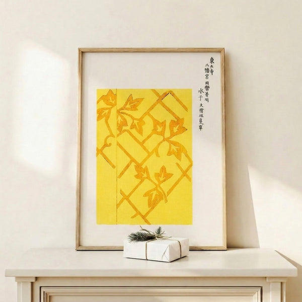 Framed wall art depicting traditional Japanese lattice design adorned with climbing leaves in warm earthy tones of gold, orange, and pale cream.
