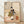 Framed Japanese woodblock print depicting a tender moment between a mother in an elegant kimono and her child in a warm domestic interior, rendered in cream, ochre, and terracotta tones.