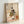 Poetic Japanese woodblock-style print of a mother and child together indoors, their figures softly rendered in cream and ochre against a calm, traditional domestic setting.
