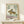 Serene scholarly artwork inspired by Ito Jakuchu, depicting a dynamic hare in ochre and cream with traditional calligraphic characters, printed and framed.