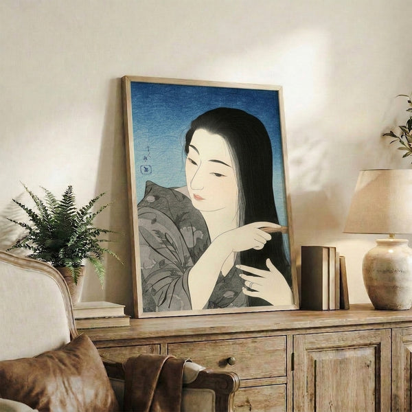 Traditional-style woodblock portrait featuring graceful woman in ornate kimono, abstract and contemplative in mood, palette of soft blues, blacks, and neutral tones.