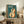 Vintage-inspired jazz wall art showcasing an elegant cello amid swirling musical elements, city lights, and stars in warm gold and teal hues with art deco geometric flair and nostalgic energy.