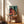 Contemporary pop art wall print featuring jazz instruments—bass and saxophone—rendered in energetic teal green, burnt orange, and deep red with gold details in a retro-modern design.
