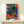 Abstract pop art wall print of a dynamic jazz performance with drum kit and instruments in striking neon colors including electric blue, hot pink, and bright yellow against a energetic background.